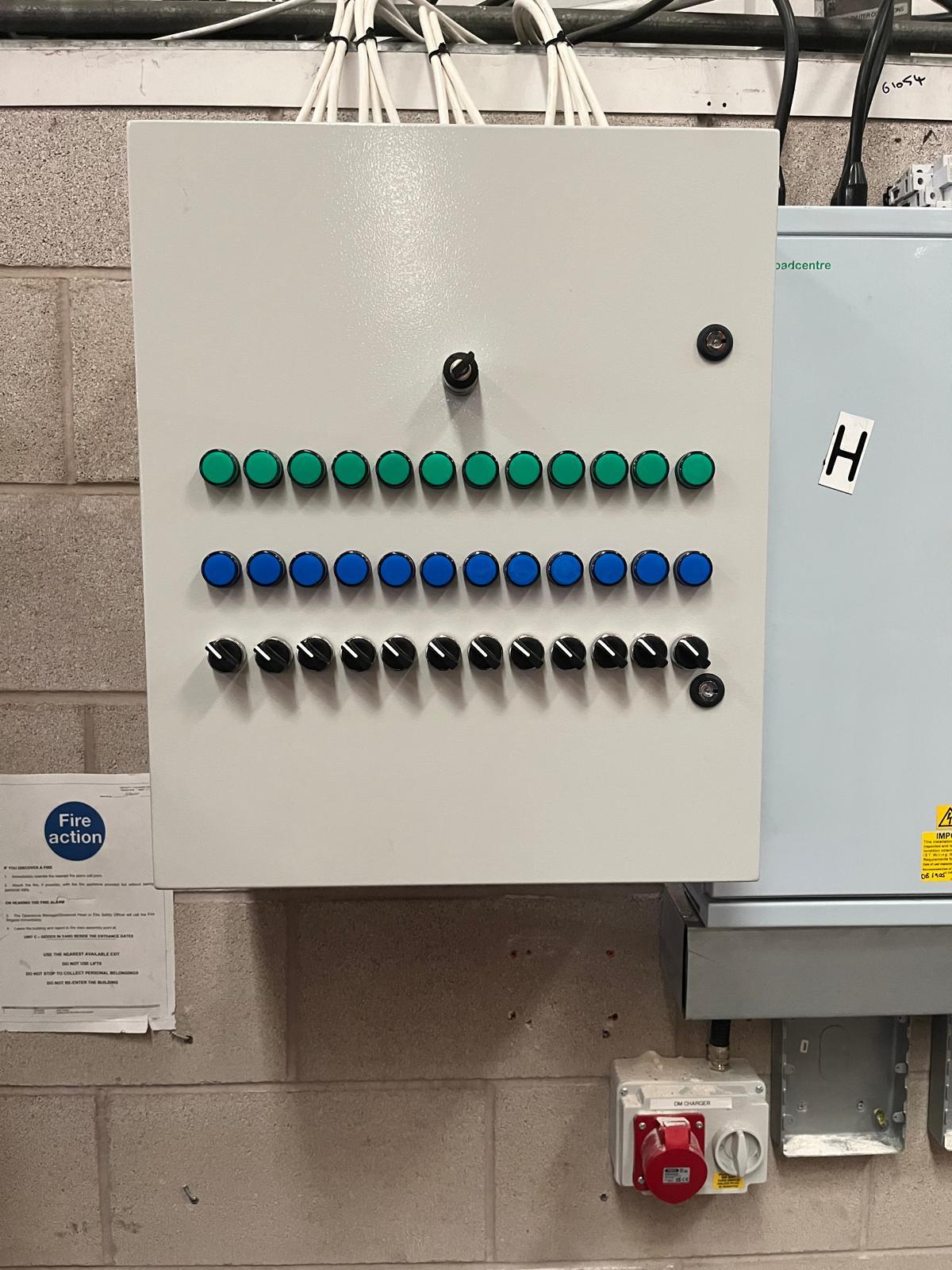 Bespoke warehouse lighting control panel with push buttons and isolator installed by A&D Electrical