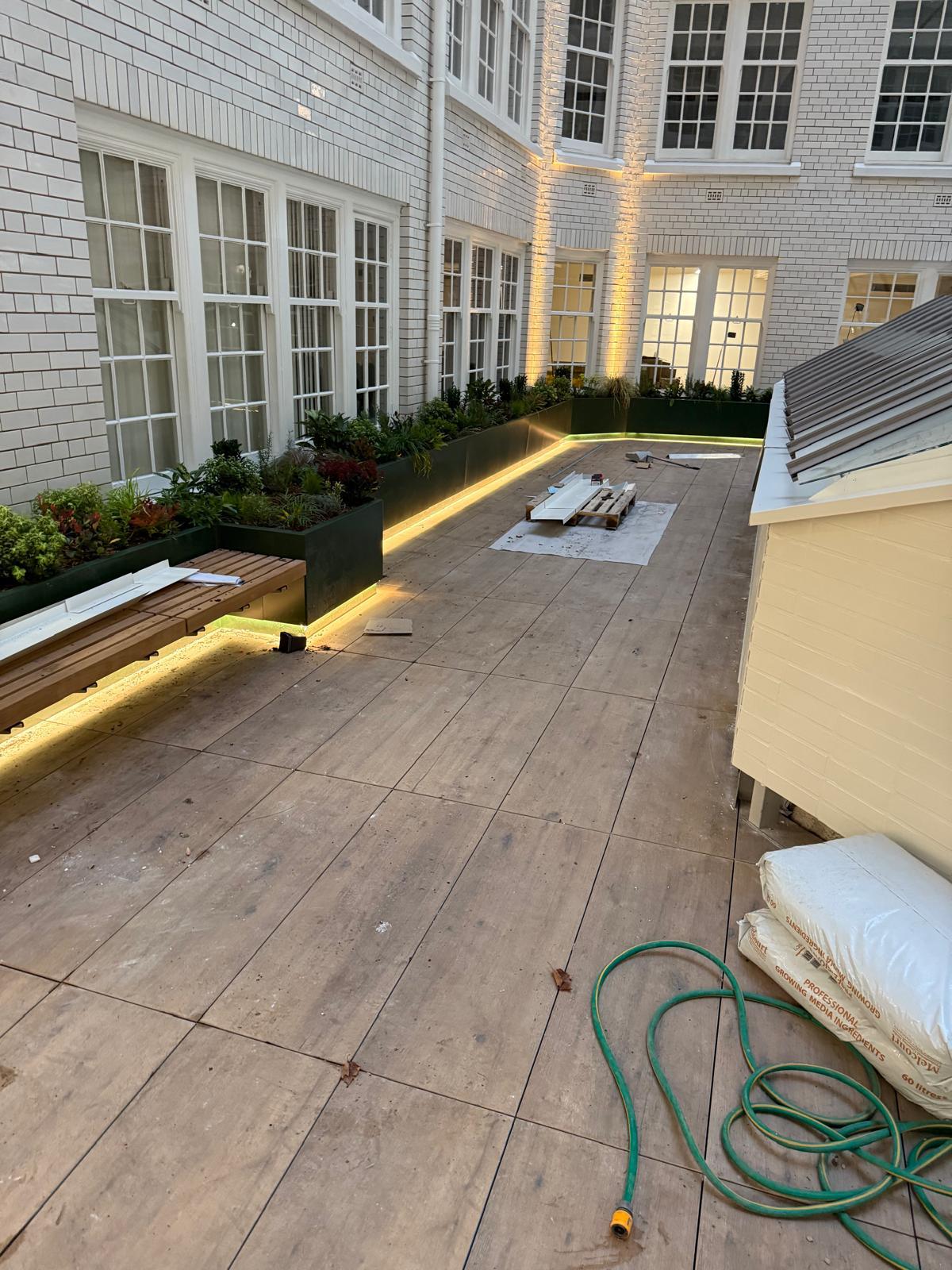 A&D Electrical Sunlight House lighting project — courtyard bench linear lighting