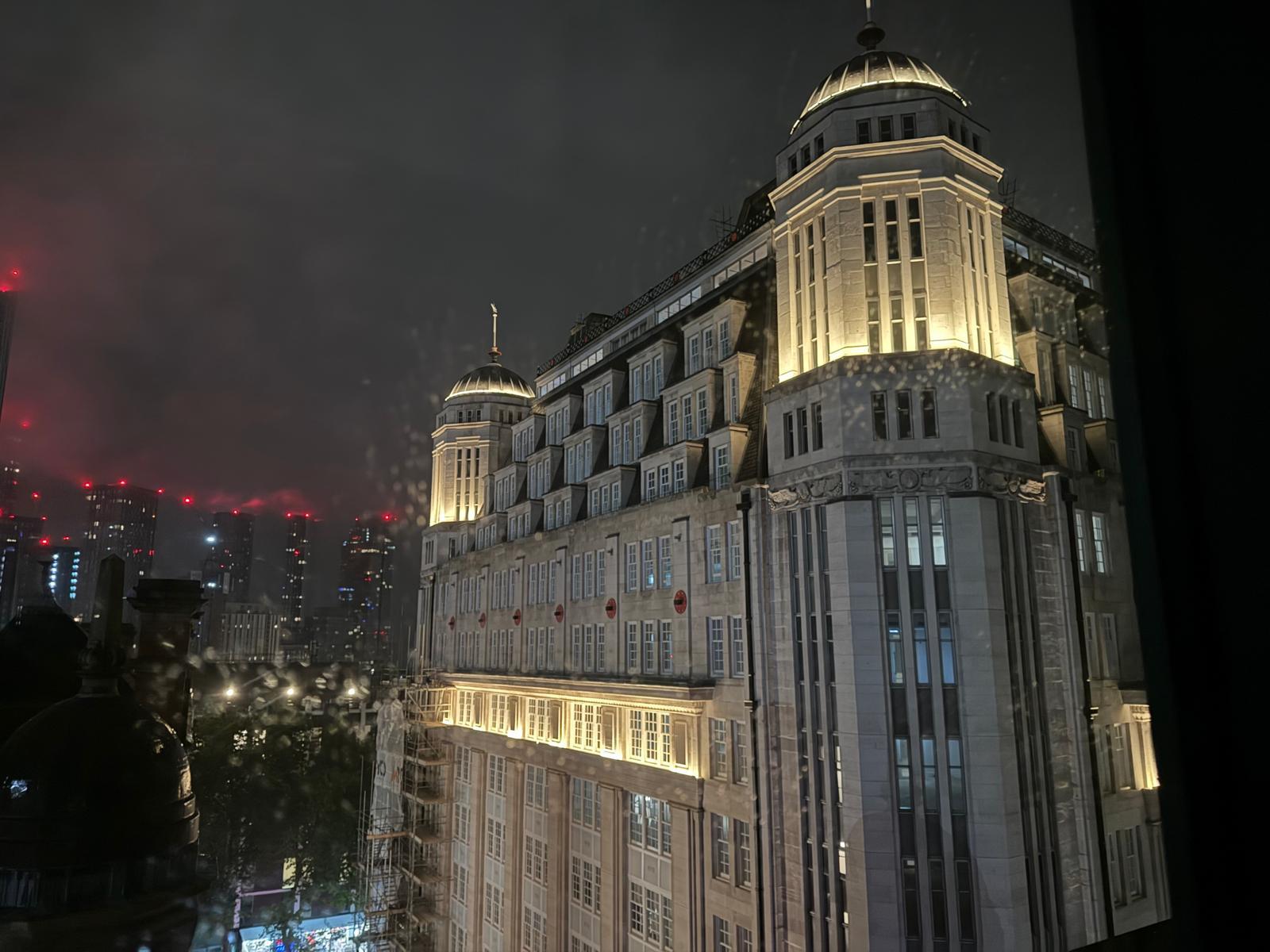 A&D Electrical Sunlight House lighting project — Art Deco tower uplighting at night